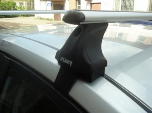 Багажник для Nissan Tiida седан с 2004г.- (пр. Атлант, арт. 7002+8828+7130)