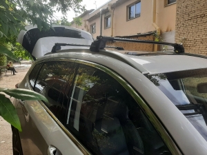 Багажник Chery Exeed на интегрированные рейлинги с замком черный