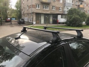 Багажник в штатные места опора Е с аэродинамической поперечиной черного цвета